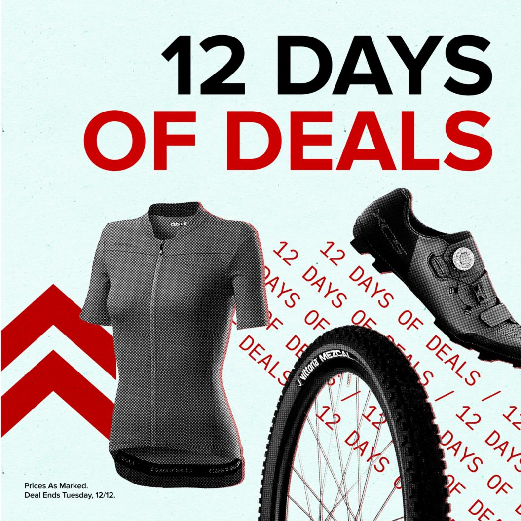 12 days of deals up to 50% off text reads near a shoe, jersey, and wheel/tire combo. There are dash and chevron graphics and a disclaimer reading prices as marked, deal ends Tuesday, 12/12. 