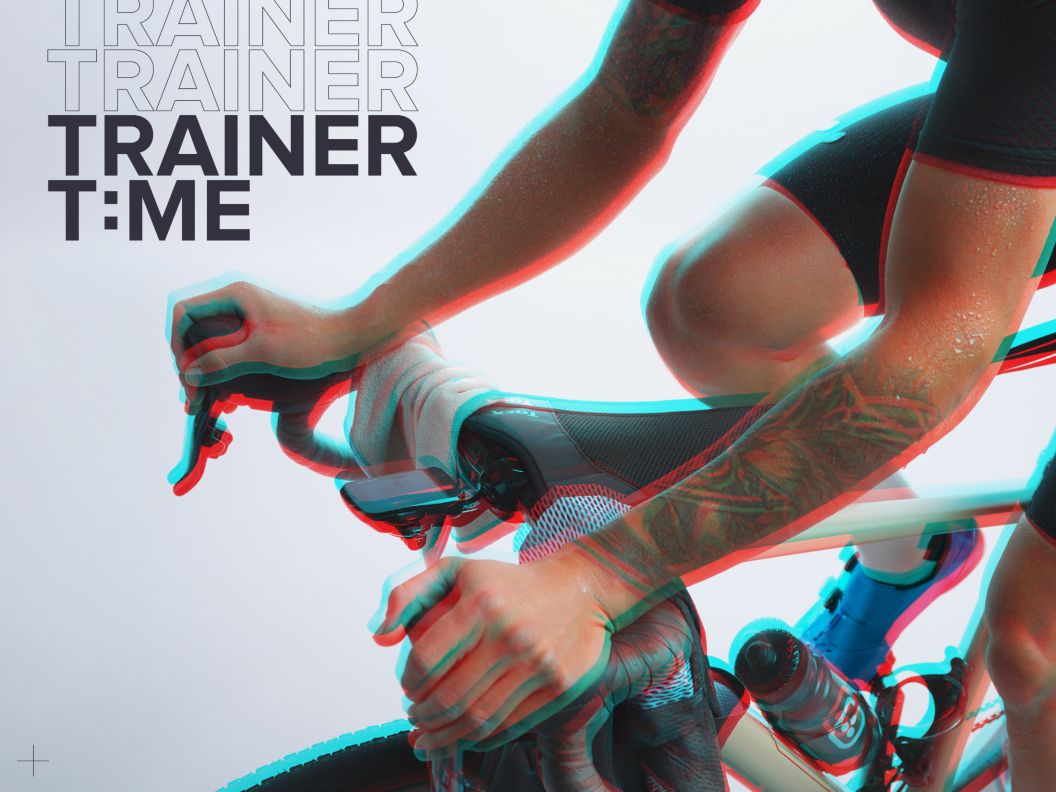 An RBG shift image of a rider training indoors on a Wahoo trainer. “Trainer Time” text is repeated a few times for graphic effect with the “I” “Time” represented as a colon. 
