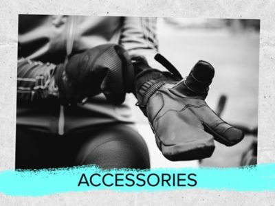 Accessories text. A photo of a rider pulling on winter gloves. 