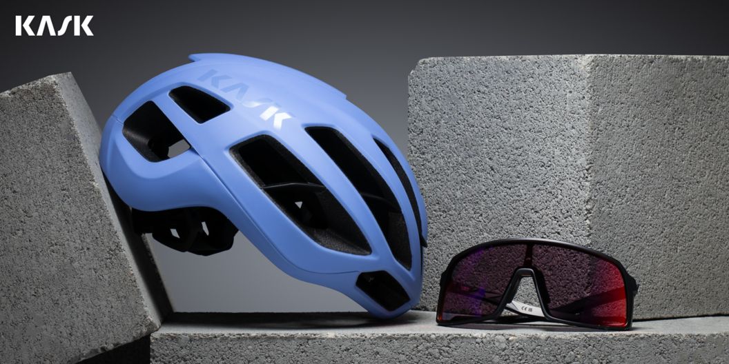 Kask Protone Icon and sunglasses on a cinderblock. 