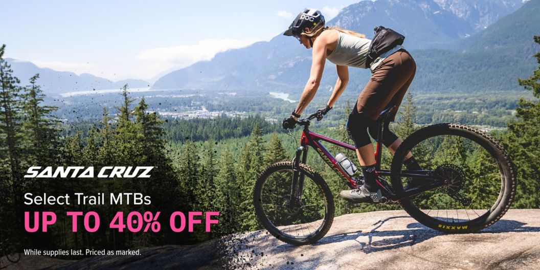   Santa Cruz sale on select MTBs up to 40% off ends Sunday, 3/31. Priced as marked. An image of a rider hucking a gap on a Santa Cruz. 