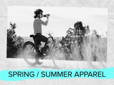Spring and summer apparel text. A photo of a cyclist on a summer ride.
