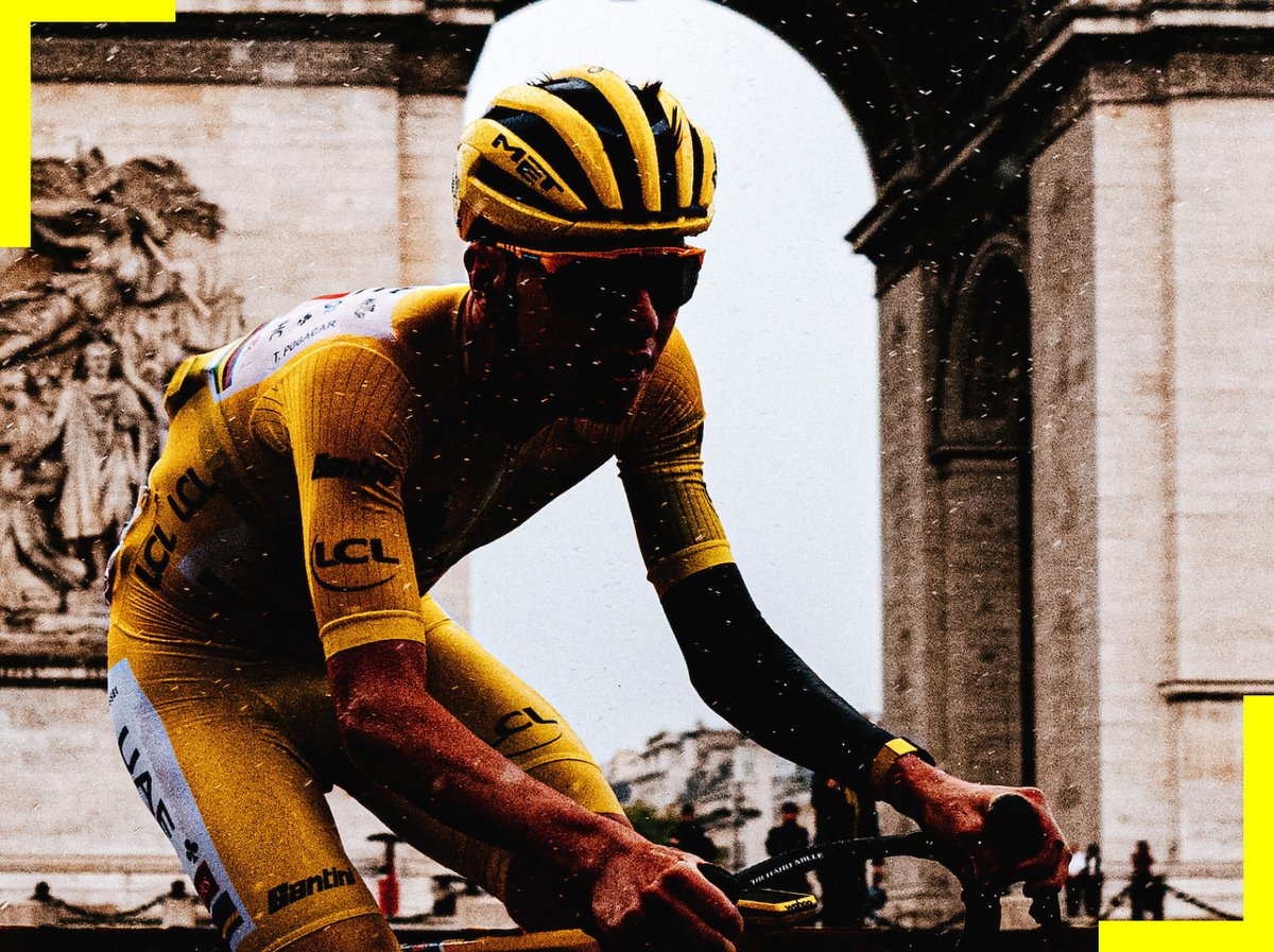 Cyclists racing past the Arc de Triomphe in Paris.
