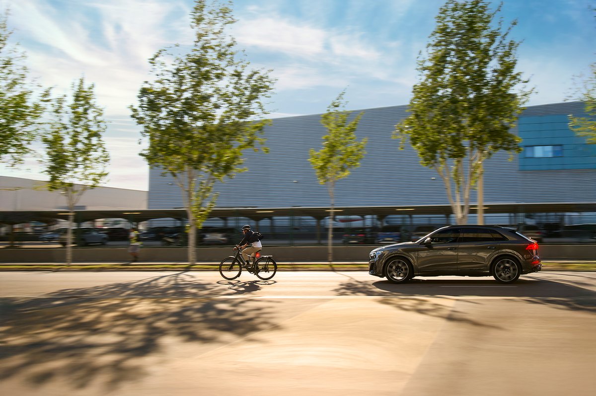 City commuter using bright rear bike light for daytime visibility