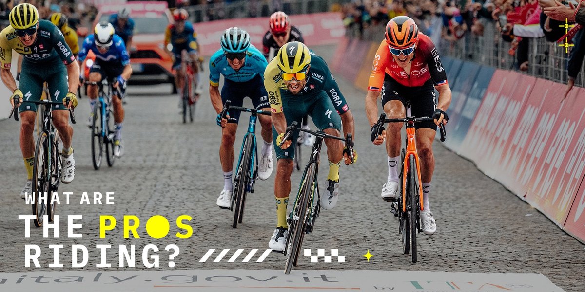 Three riders push for a photo finish on a cobblestone street in France. White and yellow text reads: “What are the pros riding?”