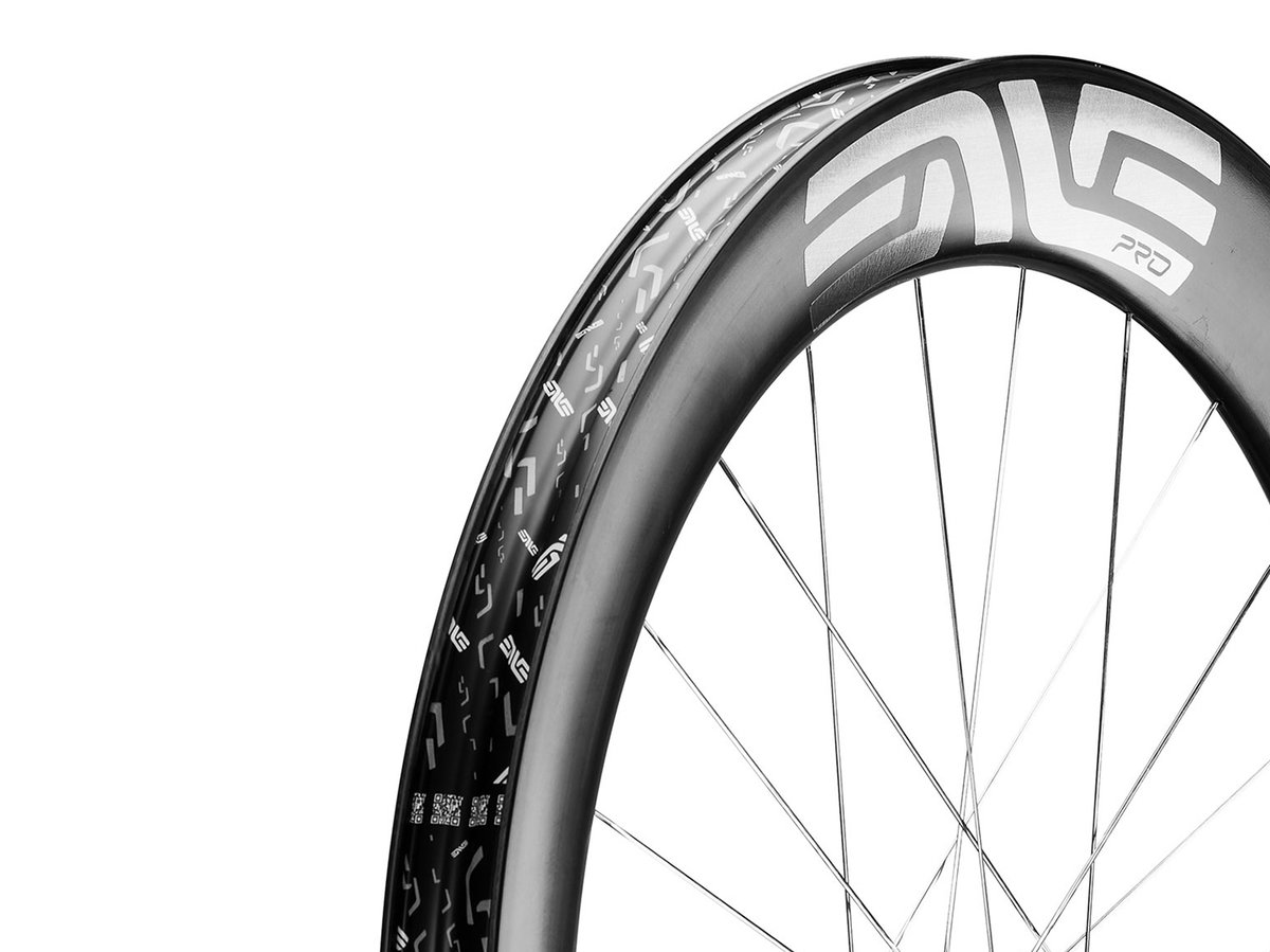 Close-up of a deep-profile ENVE G SES Pro carbon rim against a white background.