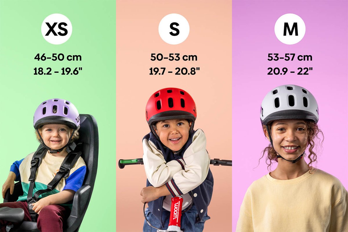 Helmet sizing chart showing three children wearing XS, S, and M helmets with corresponding head circumference ranges in centimeters and inches.