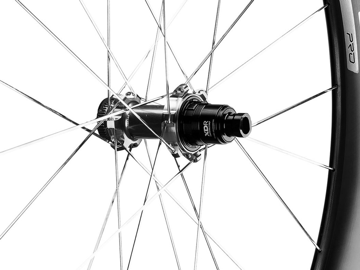 Close-up of an ENVE INNERDRIVE rear hub with XDR driver body against a white background.