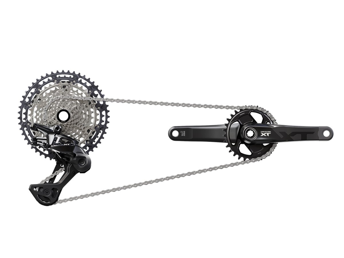 Shimano Deore XT M8200 drivetrain showing cassette, rear derailleur, chain, and crankset on a white background.