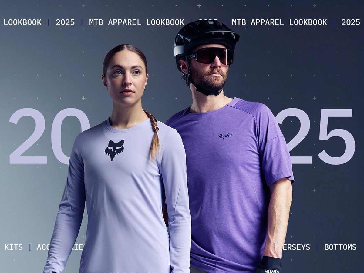 Two people in purple mountain bike apparel look onward. The words “2025 MTB Apparel Lookbook” appear to their left. The words, “Jerseys. bottoms kits, accessories” read like a ticker.