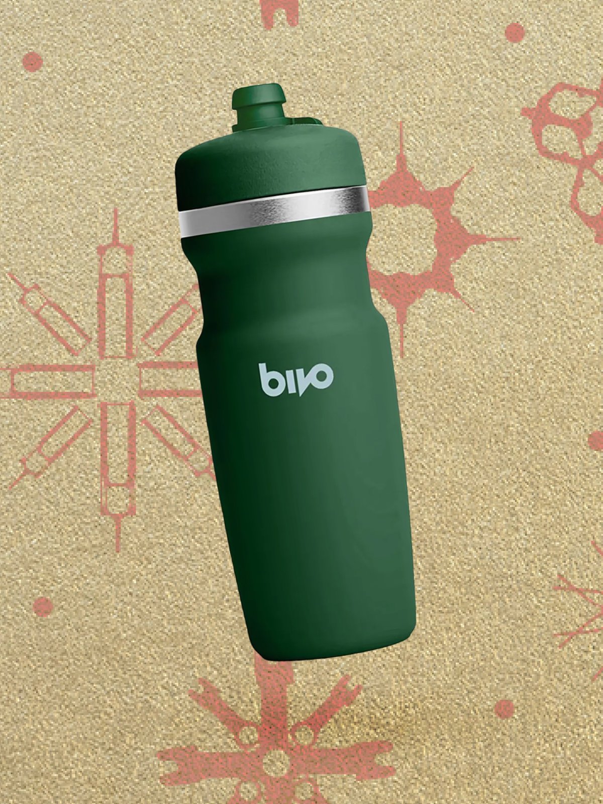 A green Bivo insulated water bottle displayed in front of a gift wrapping.