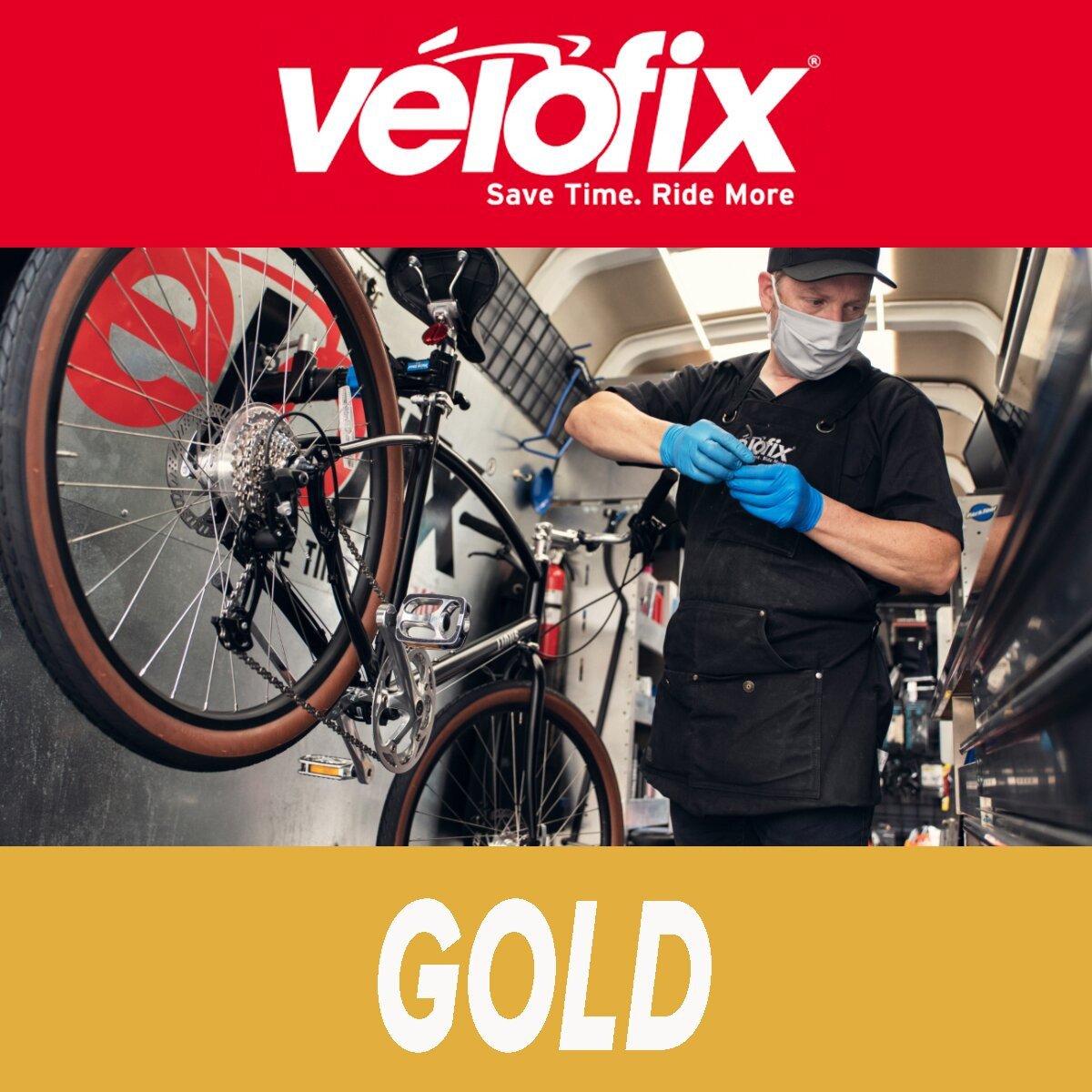 Velofix Gold tier. Shows a technician inside a velofix van repairing bikes.