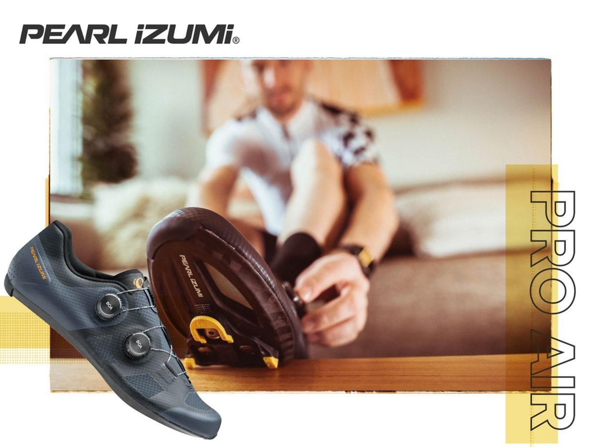 A dark ink Pro Air is shown in side-profile over an image of a road cyclist putting on the shoes while sitting on a sofa.