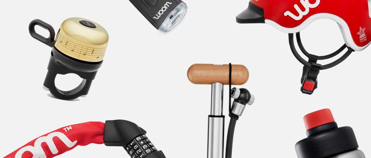 Lay flat of accessory options including a helmet, bike bump, bike light, buke lock, and waterbottle.