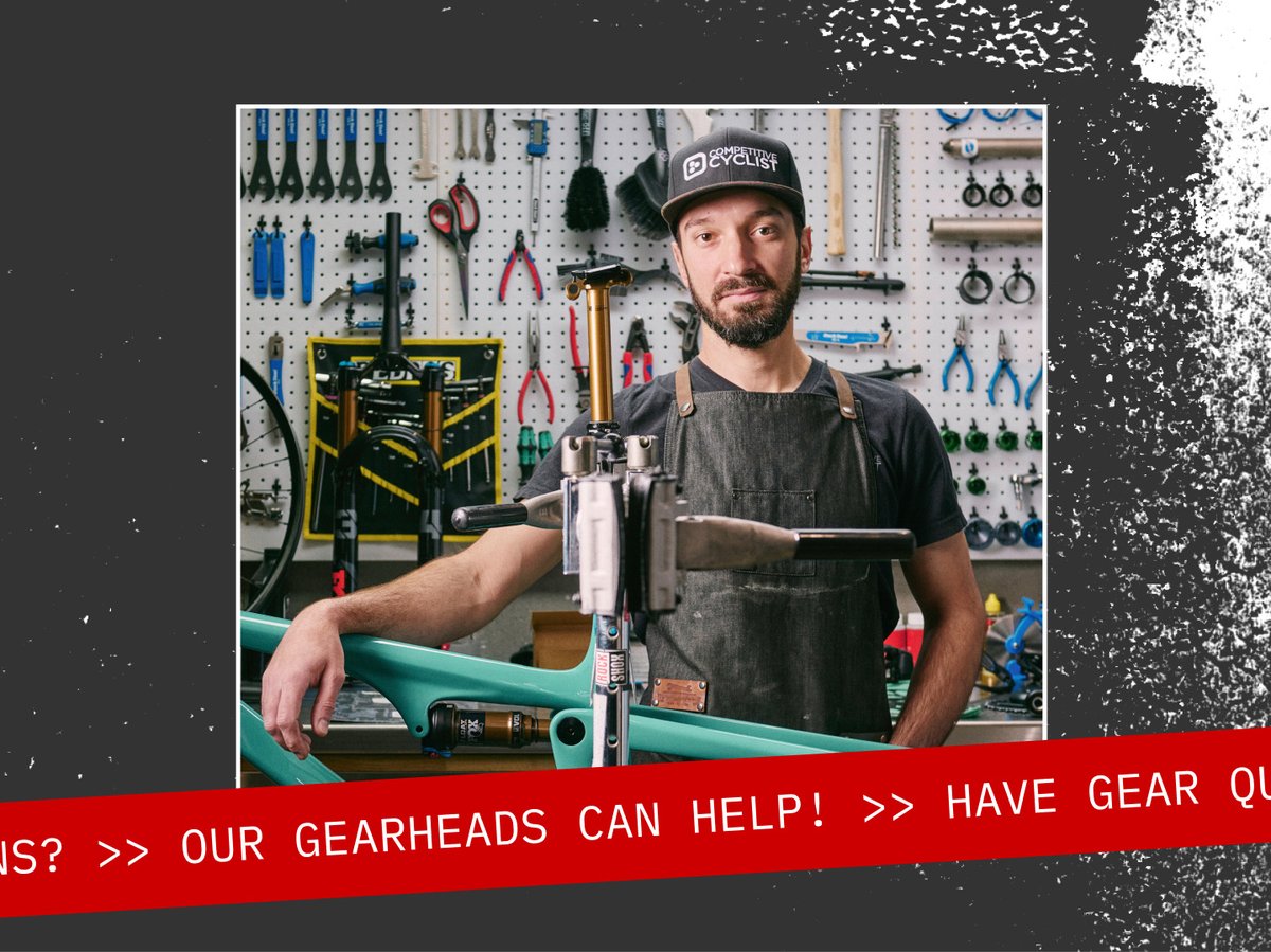 A friendly Gearhead in the garage with an e-bike.