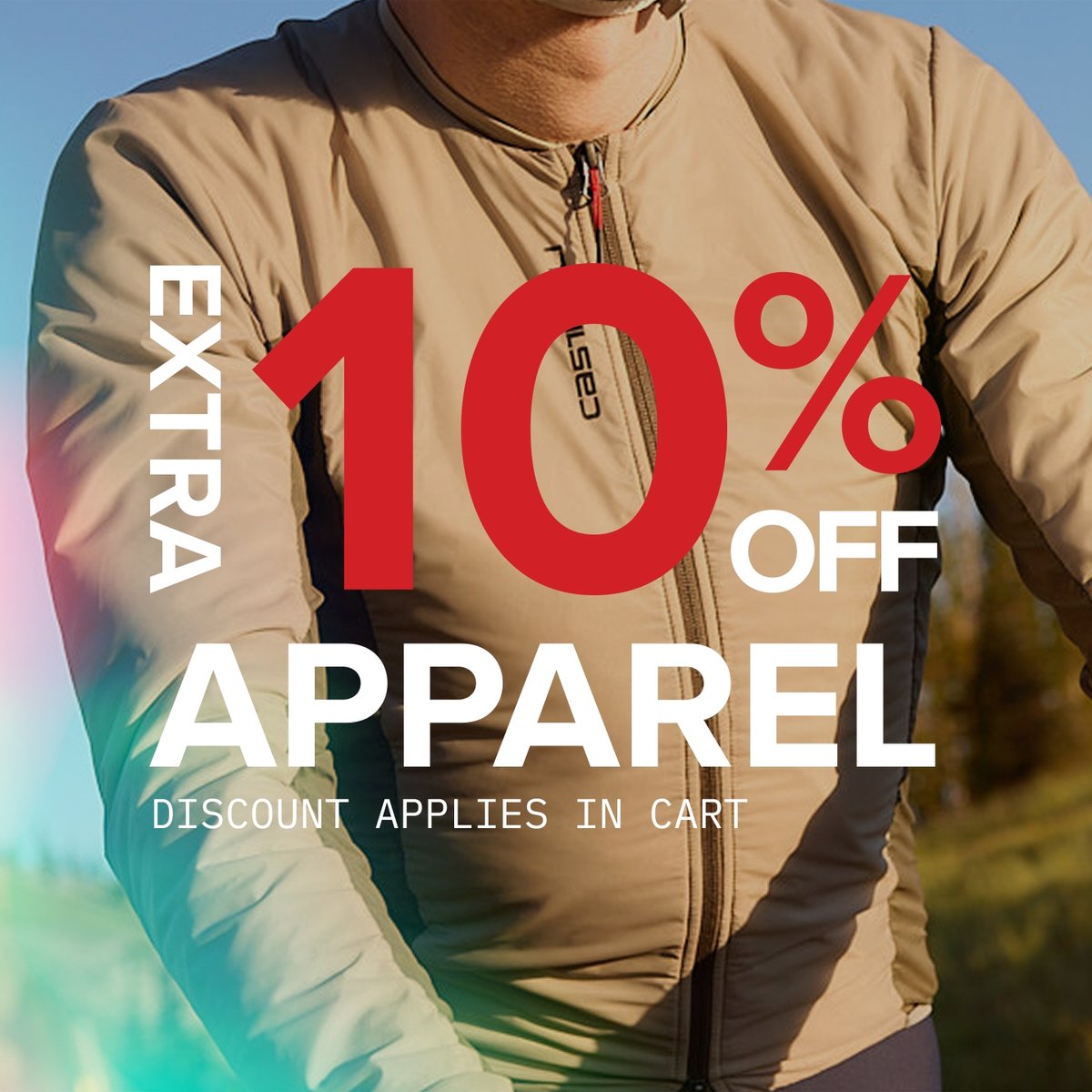 A person wearing a tan Castelli cycling jacket is shown from the neck to the waist, with overlaid text reading: "Extra 10% off apparel. Discount applies in cart."