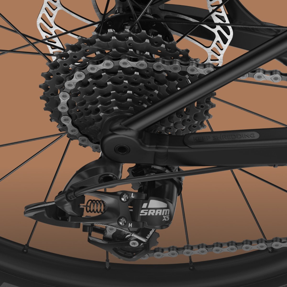 Detail shot from above of drivetrain and rear derailleur.