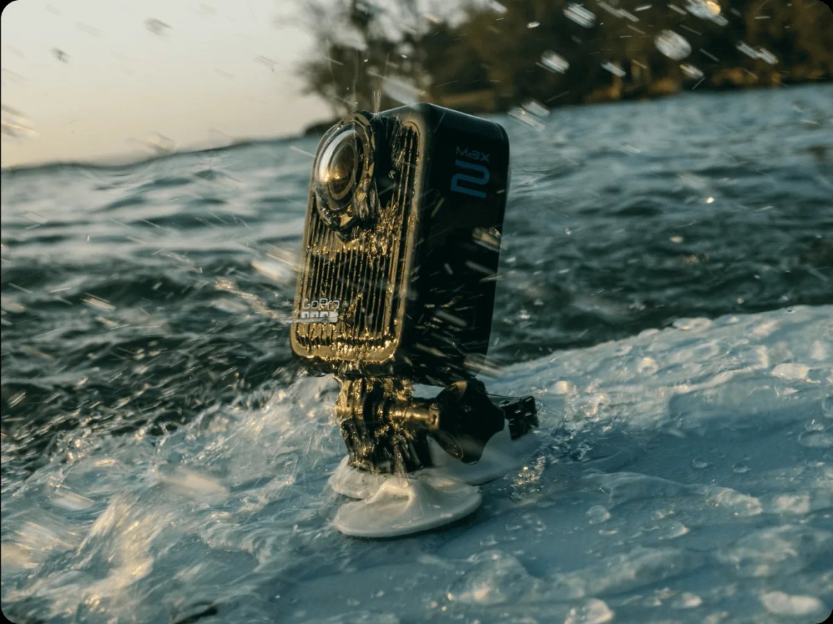 Max2 camera mounted to a surfboard in the water.